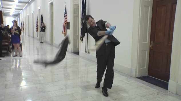 Stephen Colbert hitting salmon