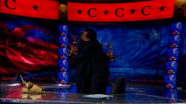 Jon Stewart and Stephen Colbert hugging